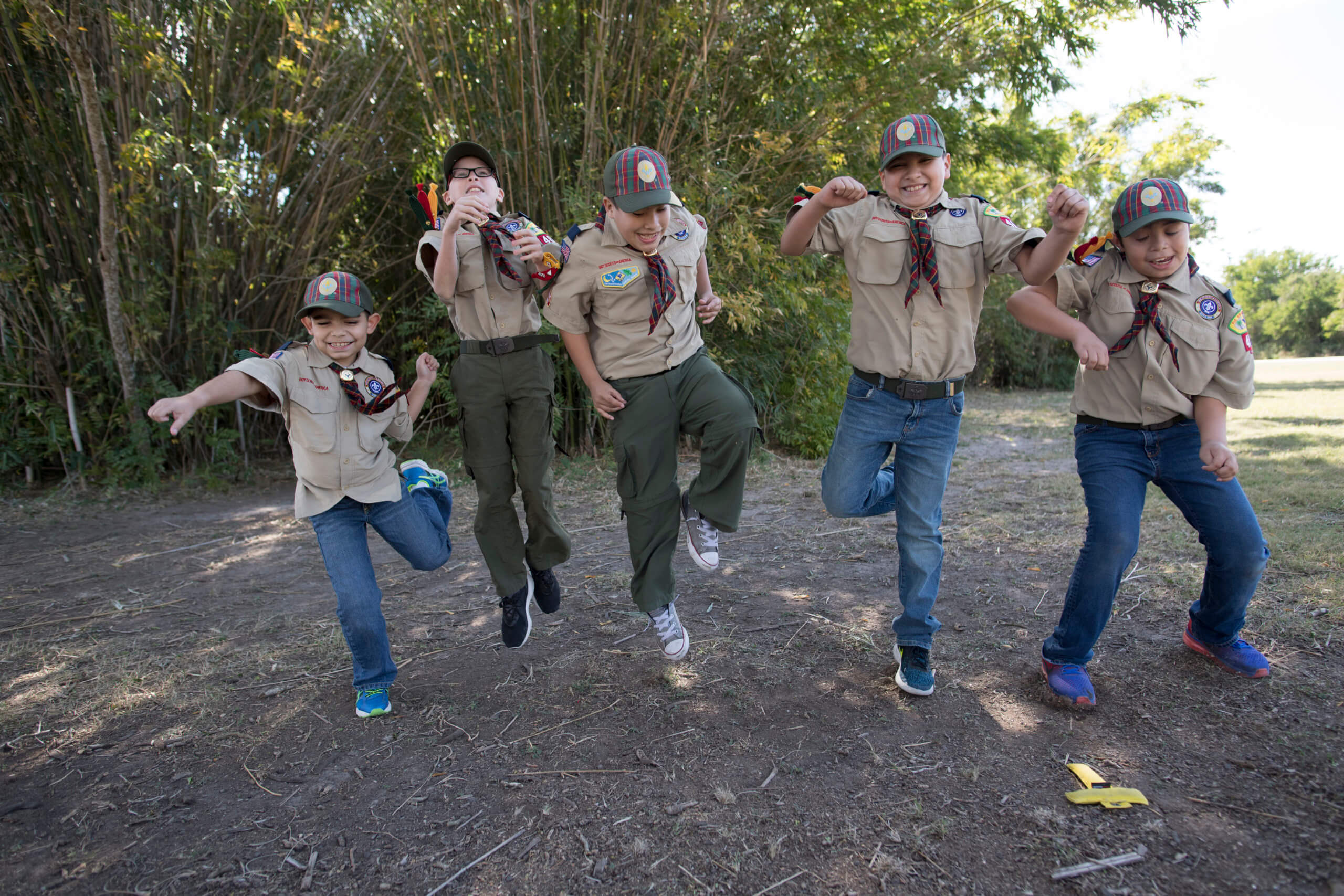 Group of Scouts jumping 20180114 Cub Scout Handbooks..****Beginning of Shooting Data Section****.NIKON D5 iso - 640 f/2.8 shutter - 1/1250.file name - 20180114_MR_1688.NEF date - 1/14/18 time - 11:55:29 AM. Camp Perry, Cub Scout Handbook